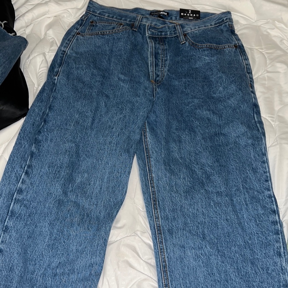 Dark wash cross over jeans